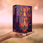 Black Woman's hand holding Wisdom of the Divine Feminine Oracle decks.